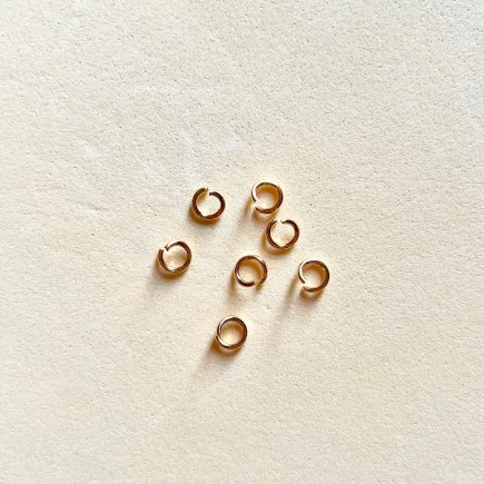 Argolla acero inoxidable - dorado - bolsa 60 uds.