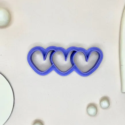 Cortador arcilla polimérica - trío de corazones horizontales
